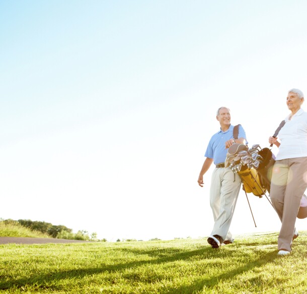 Golfer Couple on course