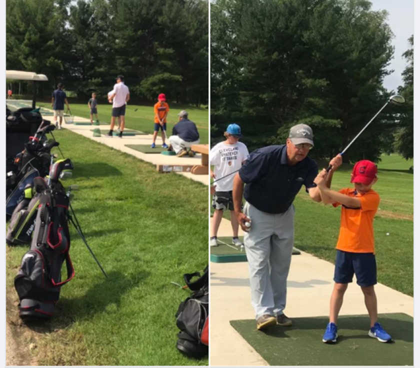 Buzz DeSalvo teaching on the driving range