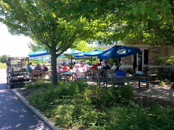 golfers gathered on patio for event at Whisper Creek Golf Club