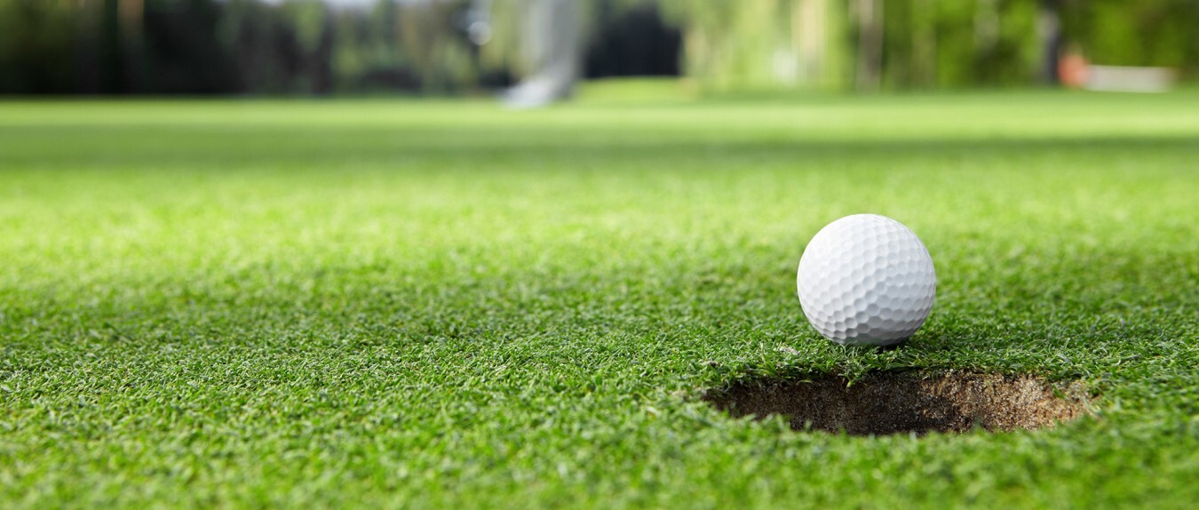 Lead Golf Ball Short of Golf Hole