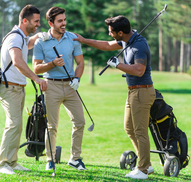 threesome of golfer guys holding clubs