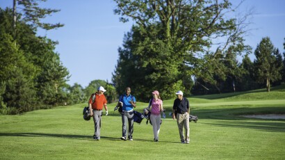 Foursome Playing Golf, Walking Golf Course