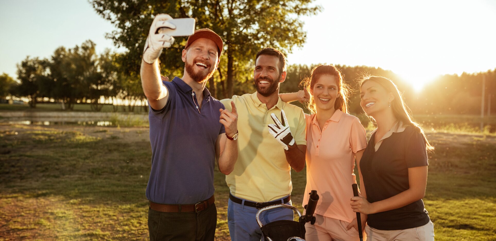 Group of golfers taking a selfie at a golf outing or golf league