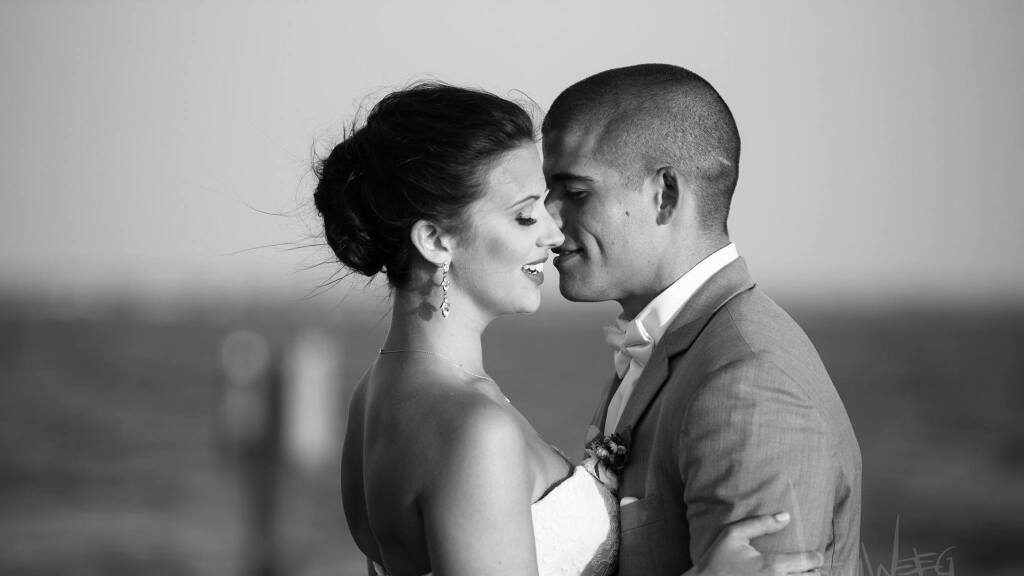 bride and groom at wedding at Captain's Cove Golf & Yacht Club