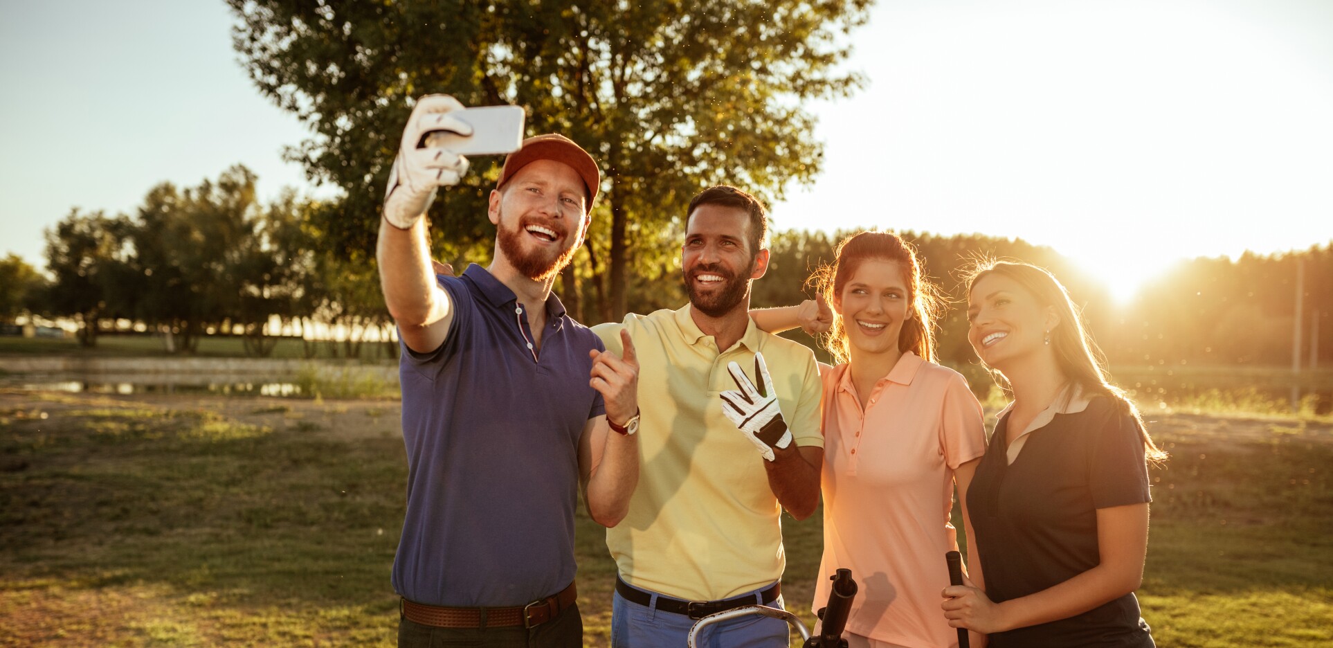 group of golfers taking a selfie