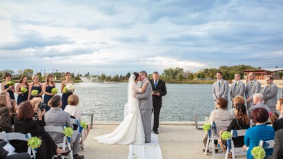 Centennial Park Lakefront Outdoor Wedding Bride and Groom Kiss