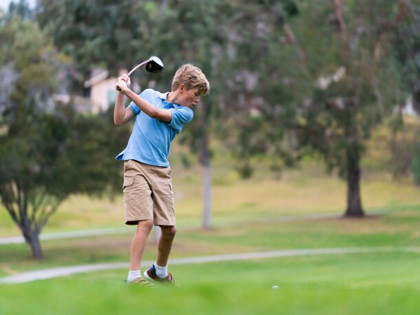 9 Year Old Boy Golfing