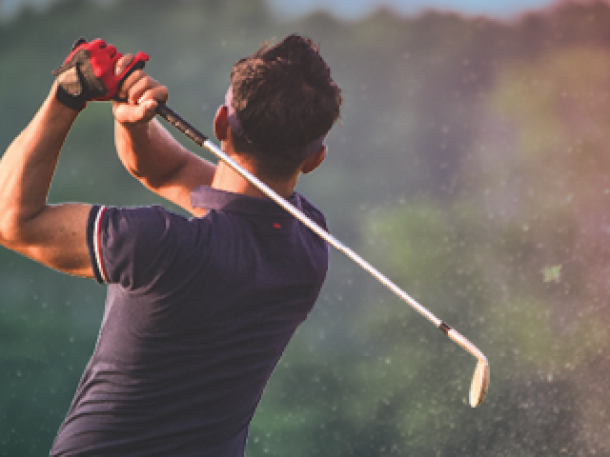 golf swing during sunrise or sunset